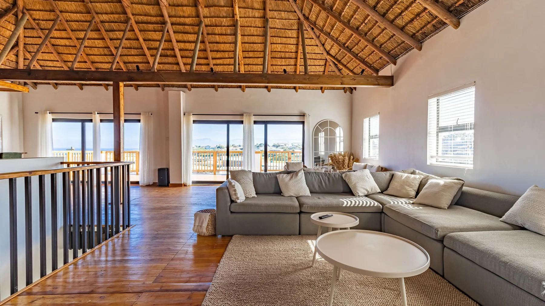 Old Harbour Place lounge and ocean-facing interior